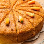 DALL·E 2024 06 03 08.55.19 A top down view of a clean kitchen counter with ingredients laid out neatly for a carrot cake without wheat flour. The ingredients include peeled and 1