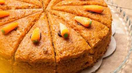 DALL·E 2024 06 03 08.55.19 A top down view of a clean kitchen counter with ingredients laid out neatly for a carrot cake without wheat flour. The ingredients include peeled and 1