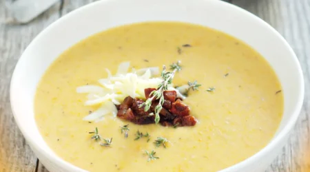 DALL·E 2024 06 07 16.00.44 A detailed high quality image showing all the ingredients needed for making a creamy potato soup including potatoes onions garlic milk cream an 1 1