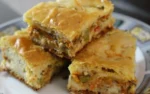 Torta de sardinha batida na mao